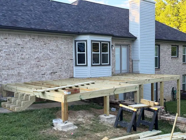 Pressure treated deck frame with joists, support posts and stair stringers in Crestwood, KY Pressure treated deck frame with joists, support posts and stair stringers in Crestwood, KY