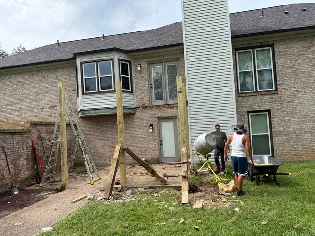 Javi’s Decks crew preparing concrete beside temporarily braced 6x6 deck support posts Javi’s Decks crew preparing concrete beside temporarily braced 6x6 deck support posts