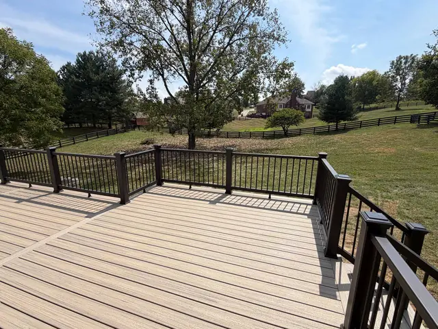 Picture frame decking border and black stair railings overlooking the Crestwood backyard Picture frame decking border and black stair railings overlooking the Crestwood backyard