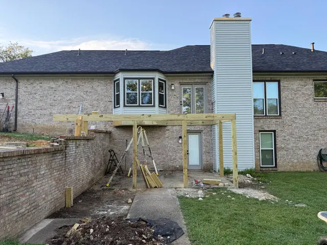 New pressure treated support posts and initial horizontal framing beside the Crestwood home New pressure treated support posts and initial horizontal framing beside the Crestwood home