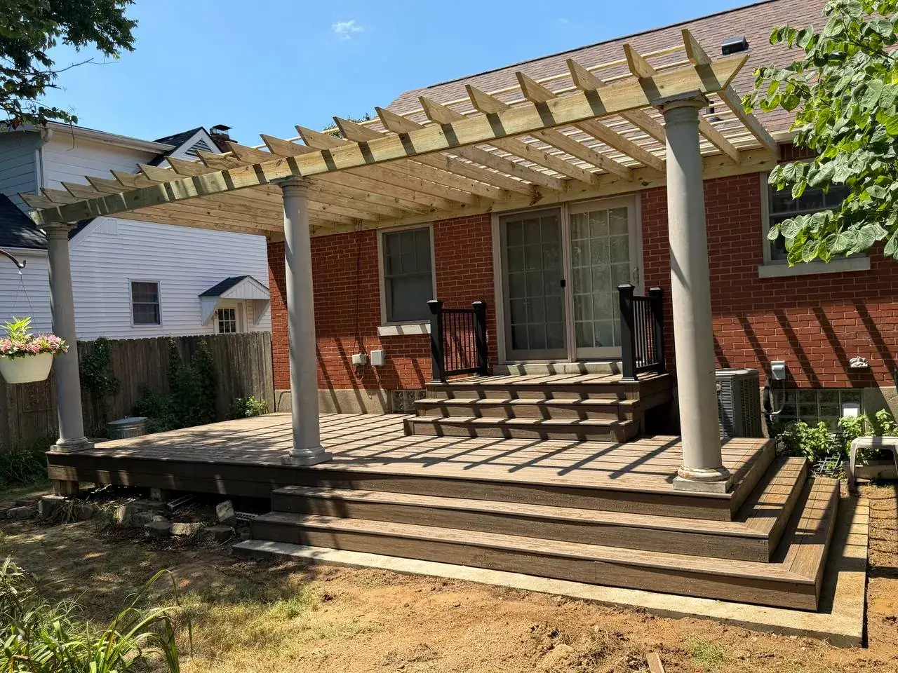 Completed composite deck with pergola and broad steps