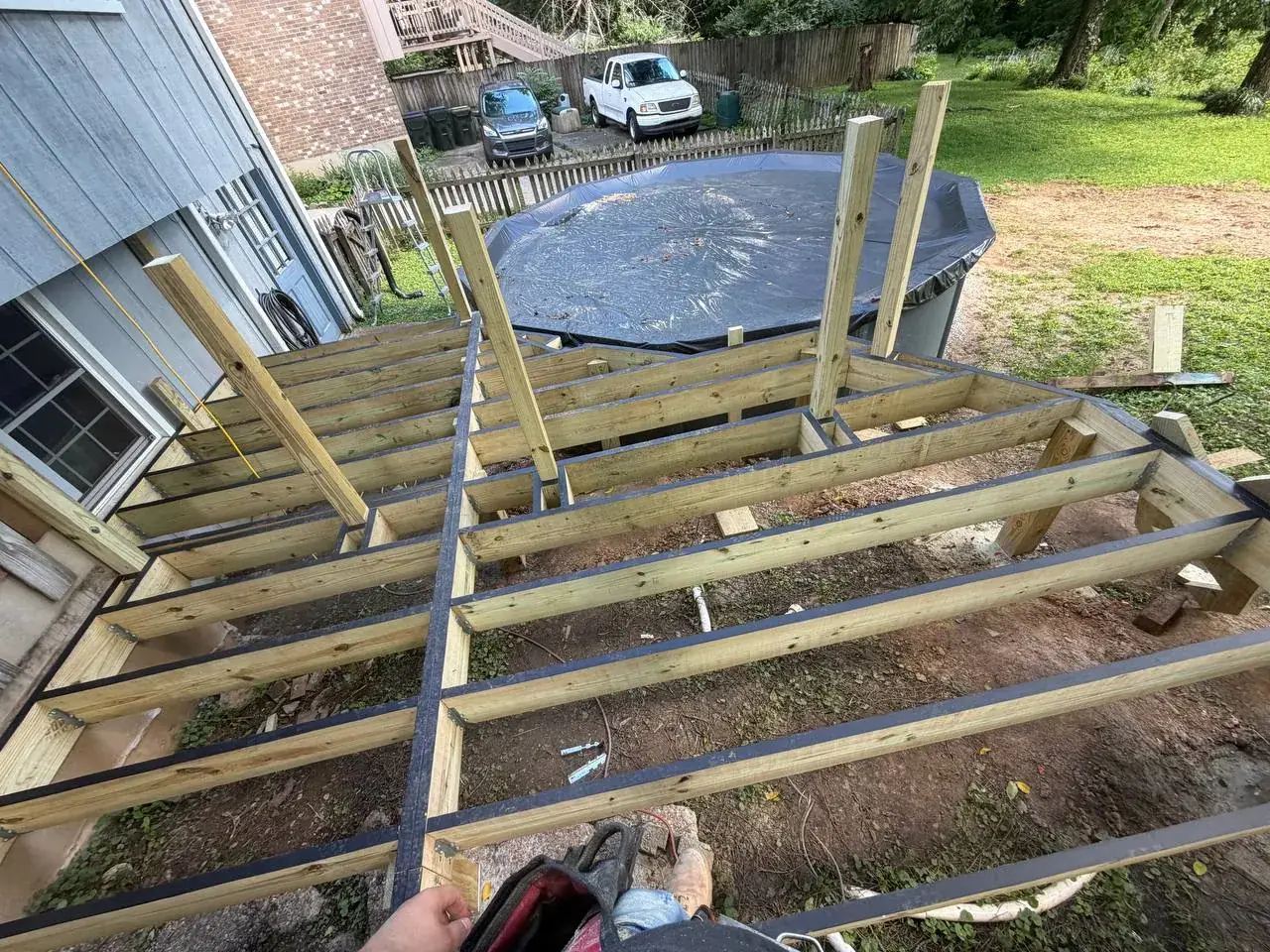 Pressure-treated deck framing during construction
