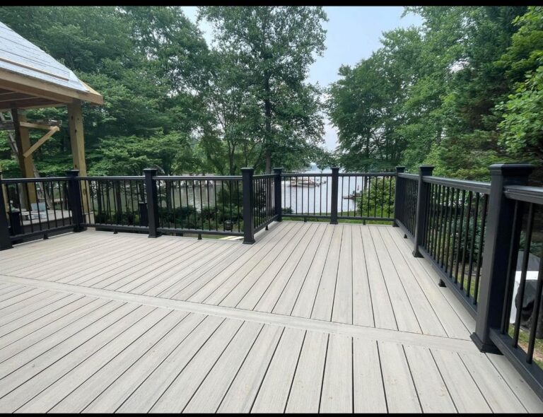 Finished TimberTech style deck with black railings in Kentucky